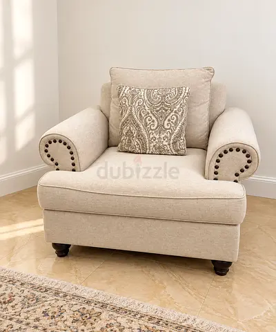 Beige Fabric Armchair with Decorative Cushion - Good Condition