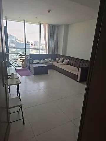 L-shaped fabric sectional sofa in good condition