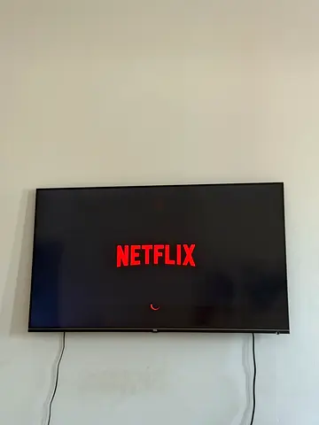 TCL 55" Smart LED TV - Good Working Condition. There is a line that comes occasionally