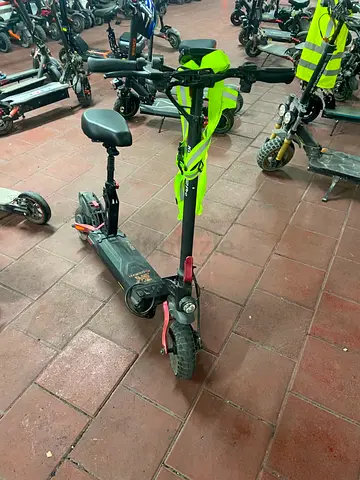 Electric scooter with seat — used, unknown condition