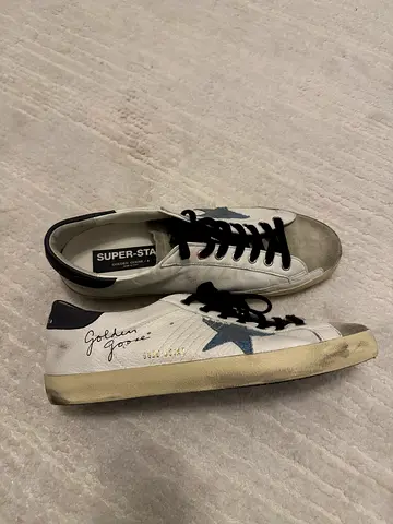 Golden Goose Super-Star in nappa leather with light blue suede star and gray leather heel tab