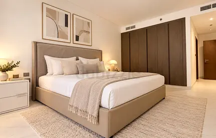 Queen upholstered bed frame with headboard in beige — excellent condition