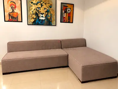 L-shaped beige fabric sofa with chaise - good condition