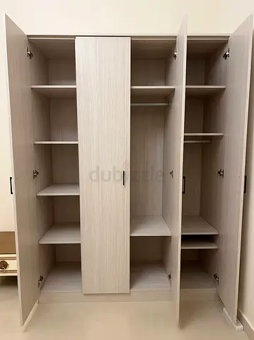 Light wood 4-door wardrobe / armoire - good condition