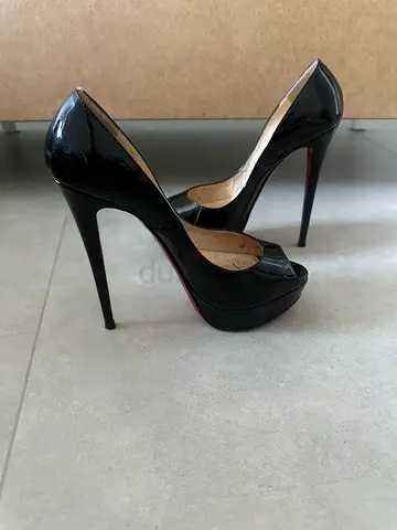 Christian Louboutin - Black patent leather high heel pumps (used)