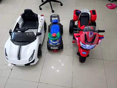 Three kids ride-on vehicles — battery car, push ride and electric motorcycle (good condition)