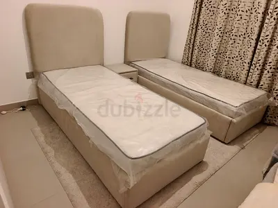 Pair of single upholstered beds with bedside table - beige