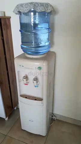 Standing Water Dispenser with Hot and Cold Water Option.0 Good Working Condition