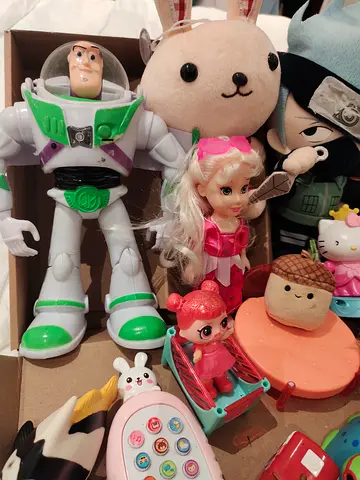 Mixed kids toys lot including Buzz Lightyear action figure and plush dolls