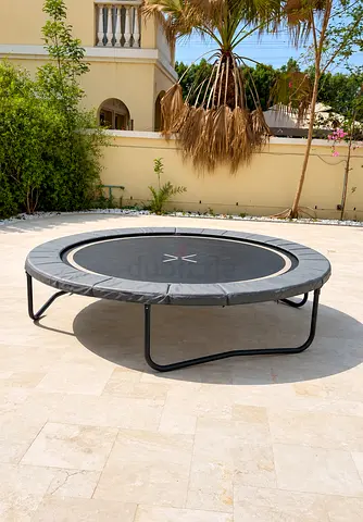 Low-profile round trampoline - good condition, sturdy frame