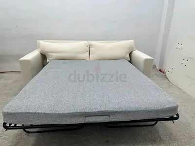 Still brand new crate&barrel three seater sofa bed