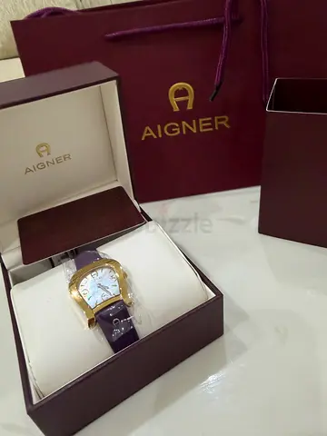 Aigner women's gold-tone leather strap wristwatch with original box