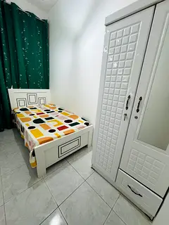 With Balcony Furnished Partition For Couple Near NMC LLH Hospital Electra St Madinat Zayed Area