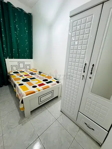 With Balcony Furnished Partition For Couple Near NMC LLH Hospital Electra St Madinat Zayed Area