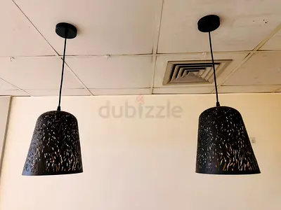 Pair of black metal pendant lamps with cut-out pattern — ready to install