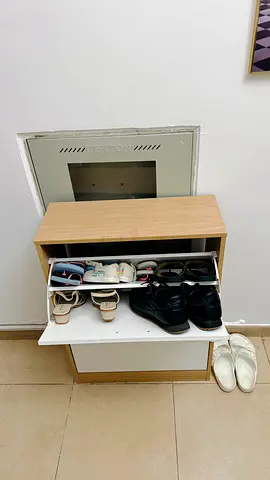 Compact shoe cabinet — light wood finish, holds 8-10 pairs