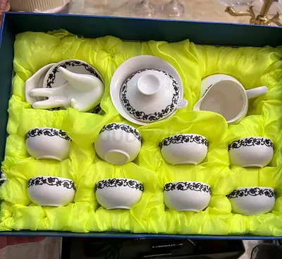 Porcelain tea set with black floral trim - unused in box