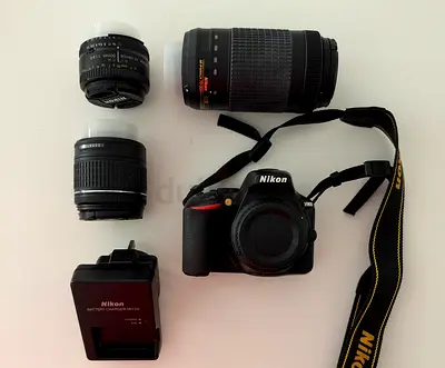 Nikon D5600 + 3 lenses + tripod + a bag