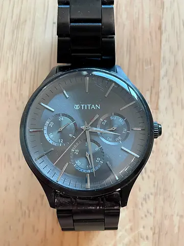 Titan men's black metal chronograph watch