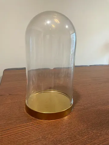 Glass display dome with gold base