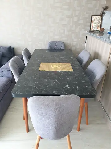 Dining table with 6 upholstered chairs - grey marble top, wooden legs