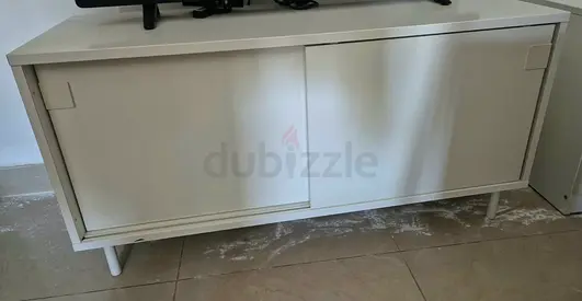 White low TV cabinet / media console with sliding doors - good condition