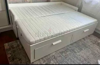 IKEA brimness Day bed with 2 storage drawers underneath and with 2 IKEA mattresses is available in e