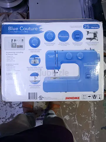 Janome Blue Couture easy-to-use mechanical sewing machine, featuring a vibrant blue finish