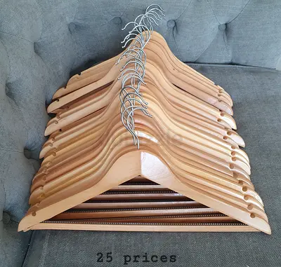 Set of 25 high-quality Wooden Clothes Hangers with Notches — Good Condition.