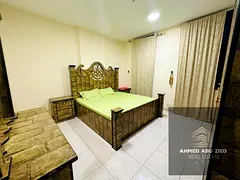 Furnished 2-bedroom apartment in Al Nuaimiya, Ajman. Central AC, 2 bathrooms and balcony. AED 4,200