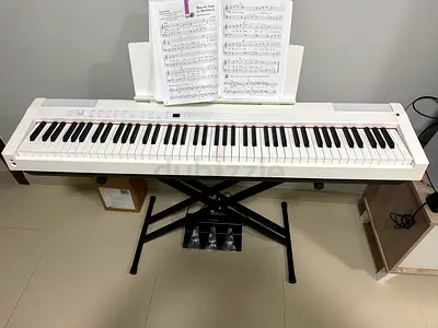 Steiner p125W piano barely used as new without the pedal