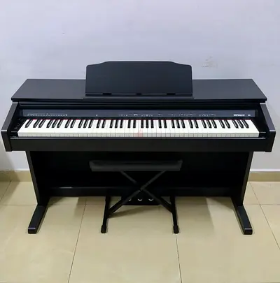 The Roland RP30 is an 88-key digital upright piano designed for home practice, studios, and learning