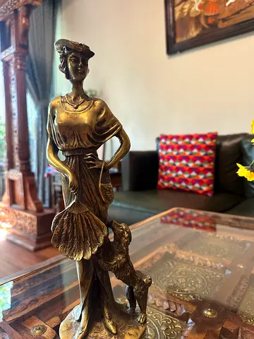 Antique heavy brass statue.