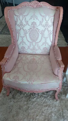 Vintage pink carved accent armchair with patterned upholstery