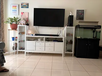 White TV console with glass display cabinets and matching stands - good condition