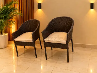 Pair of rattan-style outdoor/indoor armchairs