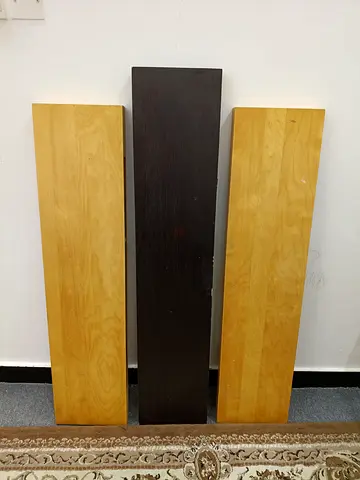 Set of 3 wooden IKEA LACK floating wall shelves.