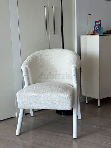 White boucle accent chair with ottoman - modern cozy seating