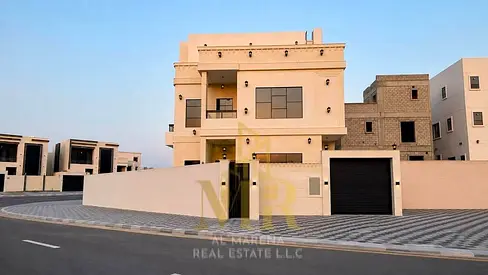 Corner villa in Al Helio 2, featuring two floors and a roof terrace, plus a private pool. Freehold ownership; the price includes registration and titl