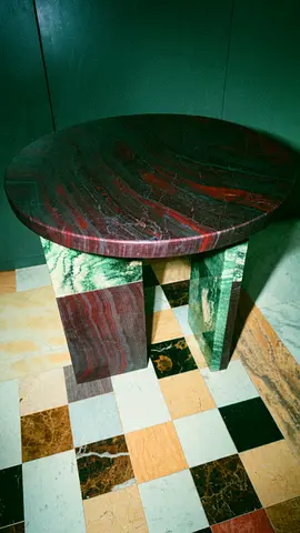 Exotic iron red coffee table with elegant base