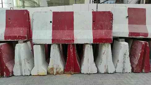 Used Concrete Road Barriers (Stacked Red & White) - Bulk