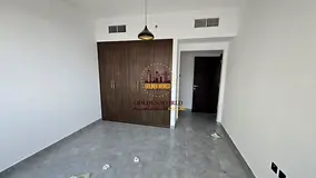 For Rent in Al Khan: 2BR + Hall, brand-new building, second tenant, 1 master bedroom, 3 bathrooms, o