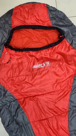 Red Climbing sleeping bag - lightweight mummy design, used