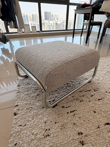 Mid-century modern loop chrome-frame ottoman with boucle upholstery