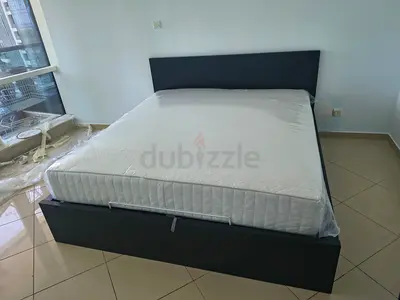 IKEA hydraulic queen‑size bed (160 × 200 cm) with  IKEA mattress