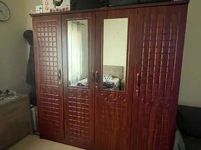 Solid Wood 4-Door Wardrobe with Mirror — Good Condition