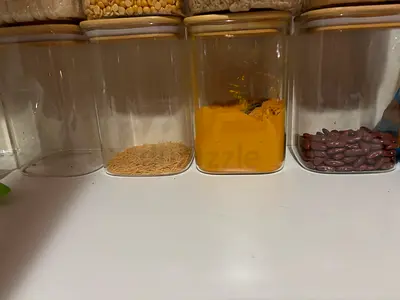 Set of clear airtight kitchen storage jars (3 shown)