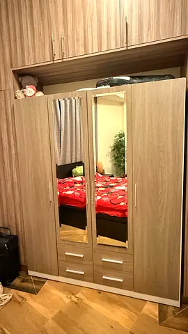 4-door mirrored wardrobe with overhead storage and drawers- good condition