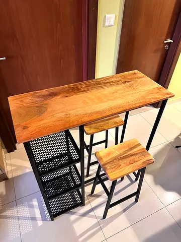 Standing table with stools
