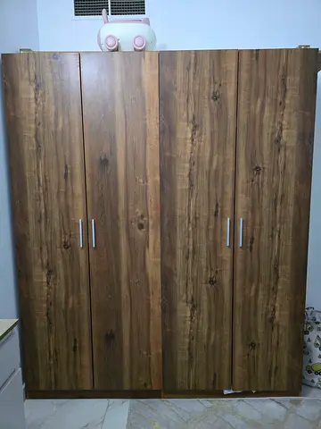 4-door wooden wardrobe in good condition, rustic finish